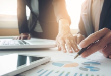 Quality Management: Getting Your Executives on Board Executives_reviewing_quality_graphs