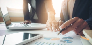 Executives_reviewing_quality_graphs